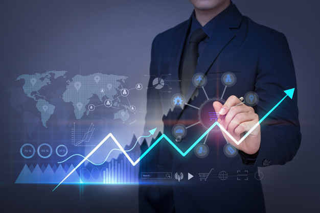 Businessman is drawing financial growth graph and analyzing busi" border="0