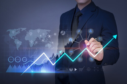 Businessman is drawing financial growth graph and analyzing business data, business plan and strategy concept .