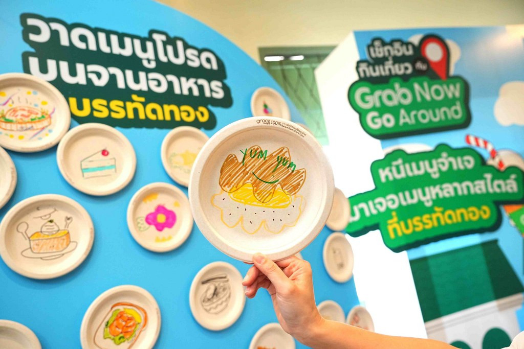 A hand holding a plate with drawings on it
AI-generated content may be incorrect.