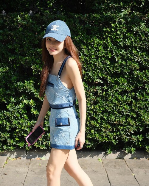 Photo-by-Panward-Hemmanee-on-March-29-2024.-May-be-an-image-of-1-person-hat-phone-miniskirt-shorts-and-text..md.jpeg