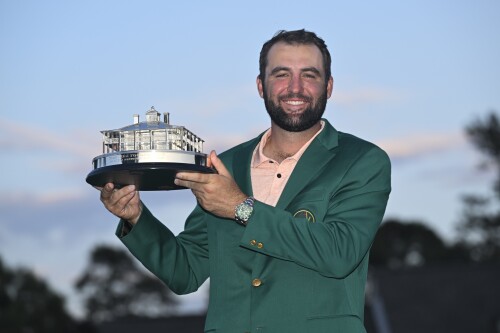 AUGUSTA, GEORGIA - APRIL 14: Scottie Scheffler poses with the winner's trophy as the 2024 Masters Champion after the final round of  Masters Tournament at Augusta National Golf Club on April 14, 2024 in Augusta, Georgia. (Photo by Ben Jared/PGA TOUR via Getty Images)
